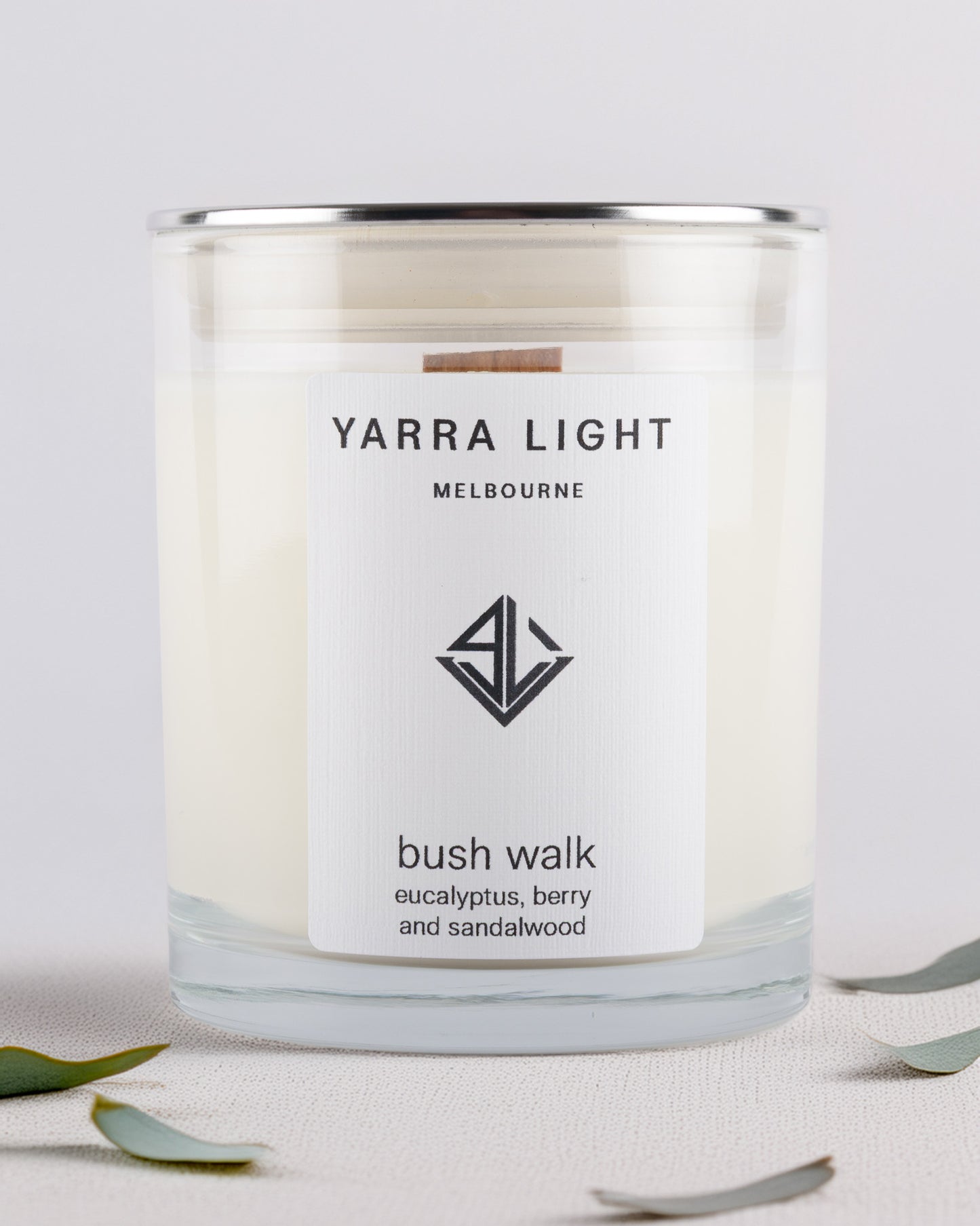Yarra Light bush walk soy wax candle with a label on a light background