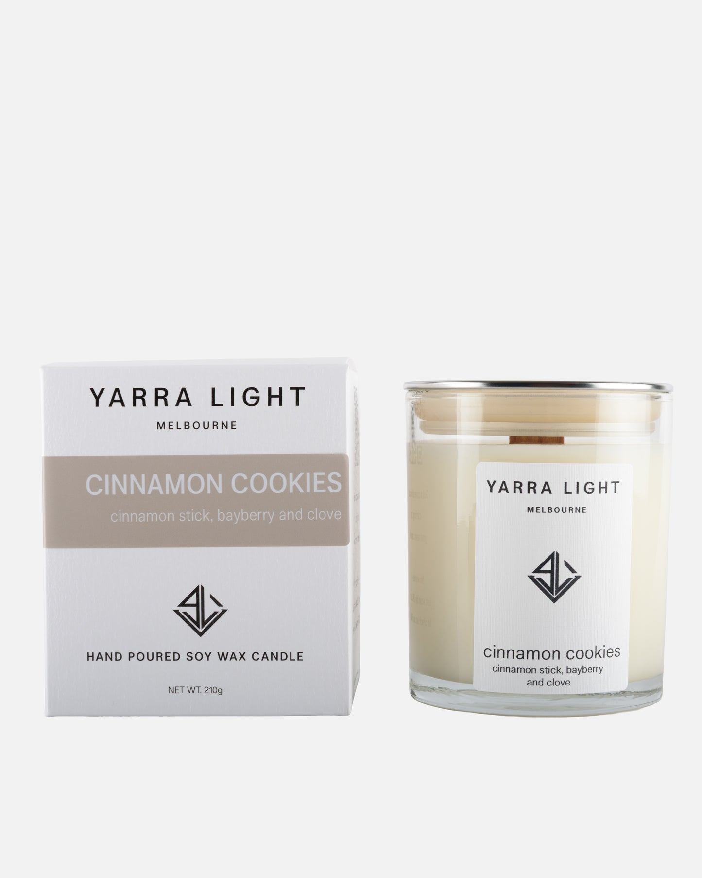 Yarra Light cinnamon cookies soy wax candle and packaging on a white background