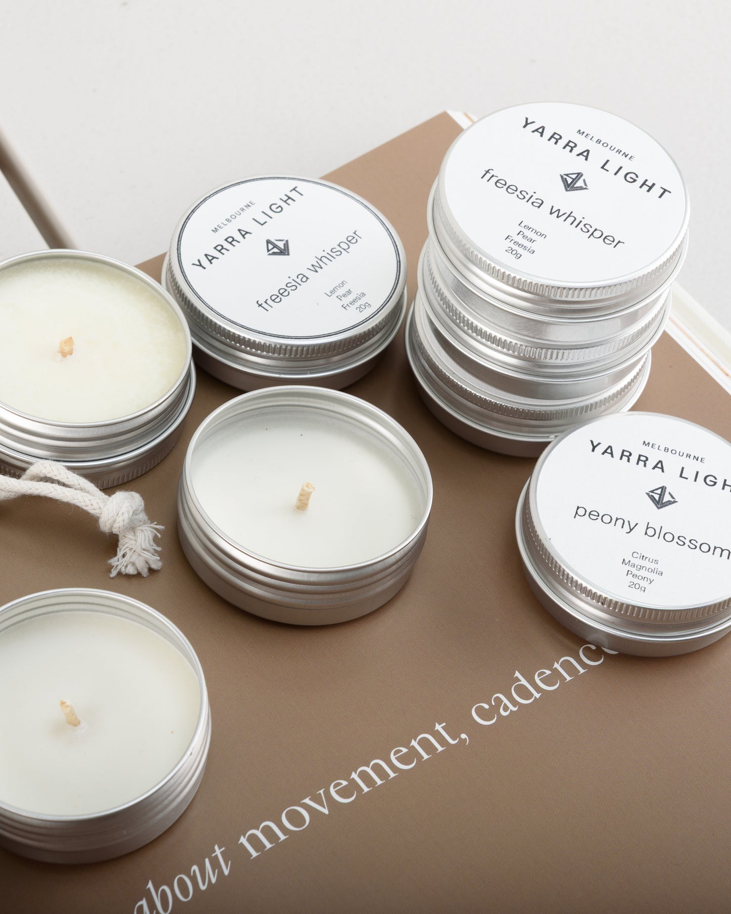 Discovery candle kit featuring ten soy wax scented sample candle tins neatly arranged in a reusable bag, ideal for trying a variety of fragrances or gifting.