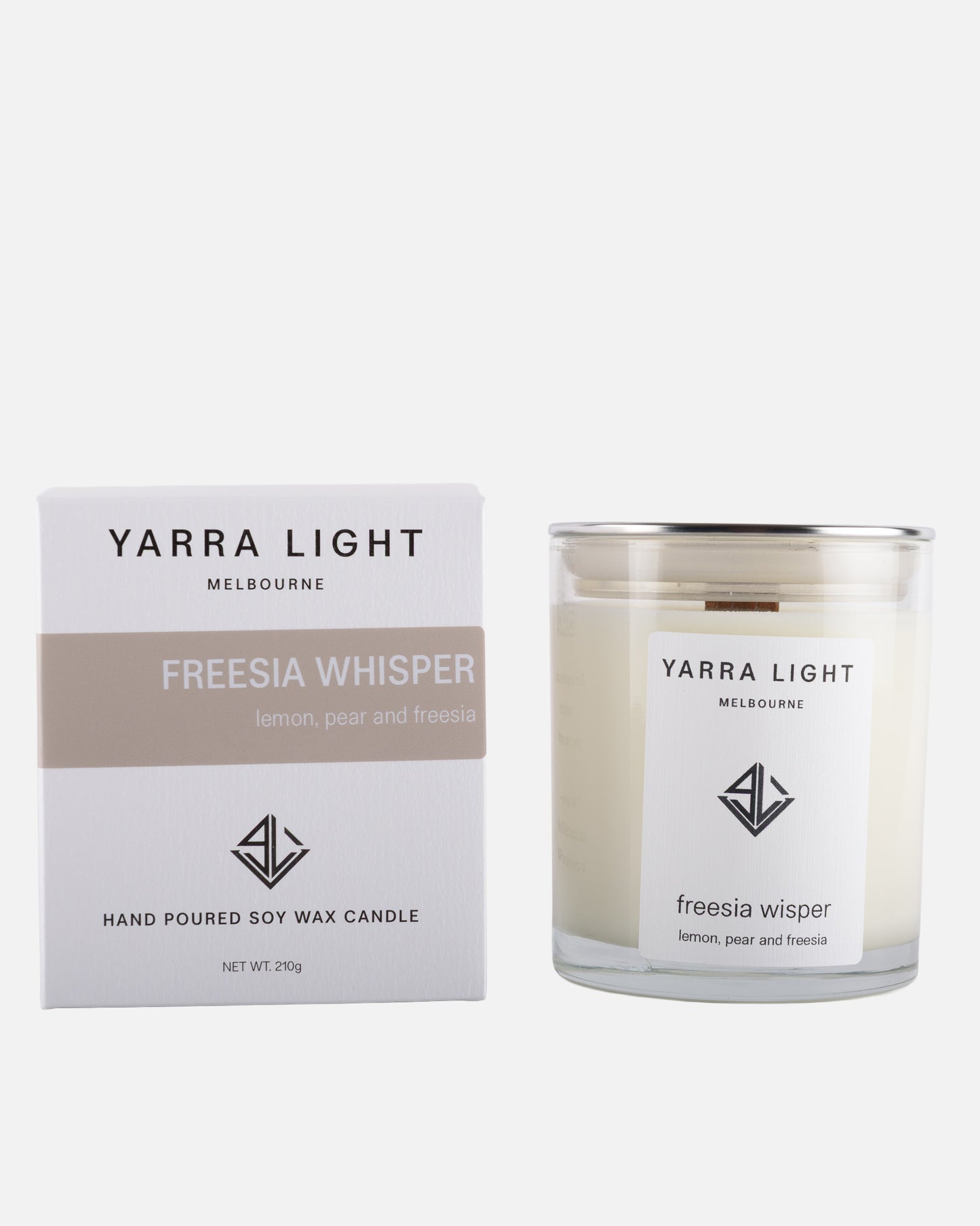 Yarra Light Freesia Whisper soy wax candle and packaging on a white background
