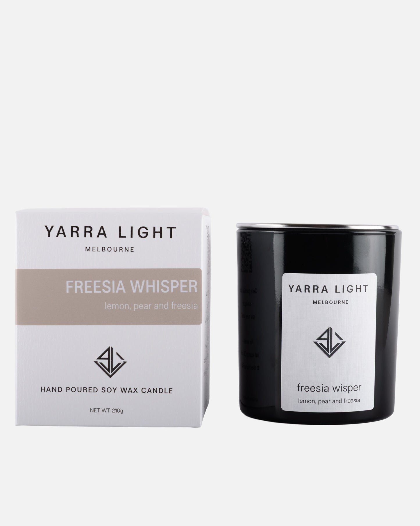 Yarra Light Freesia Whisper soy wax candle and packaging on a white background