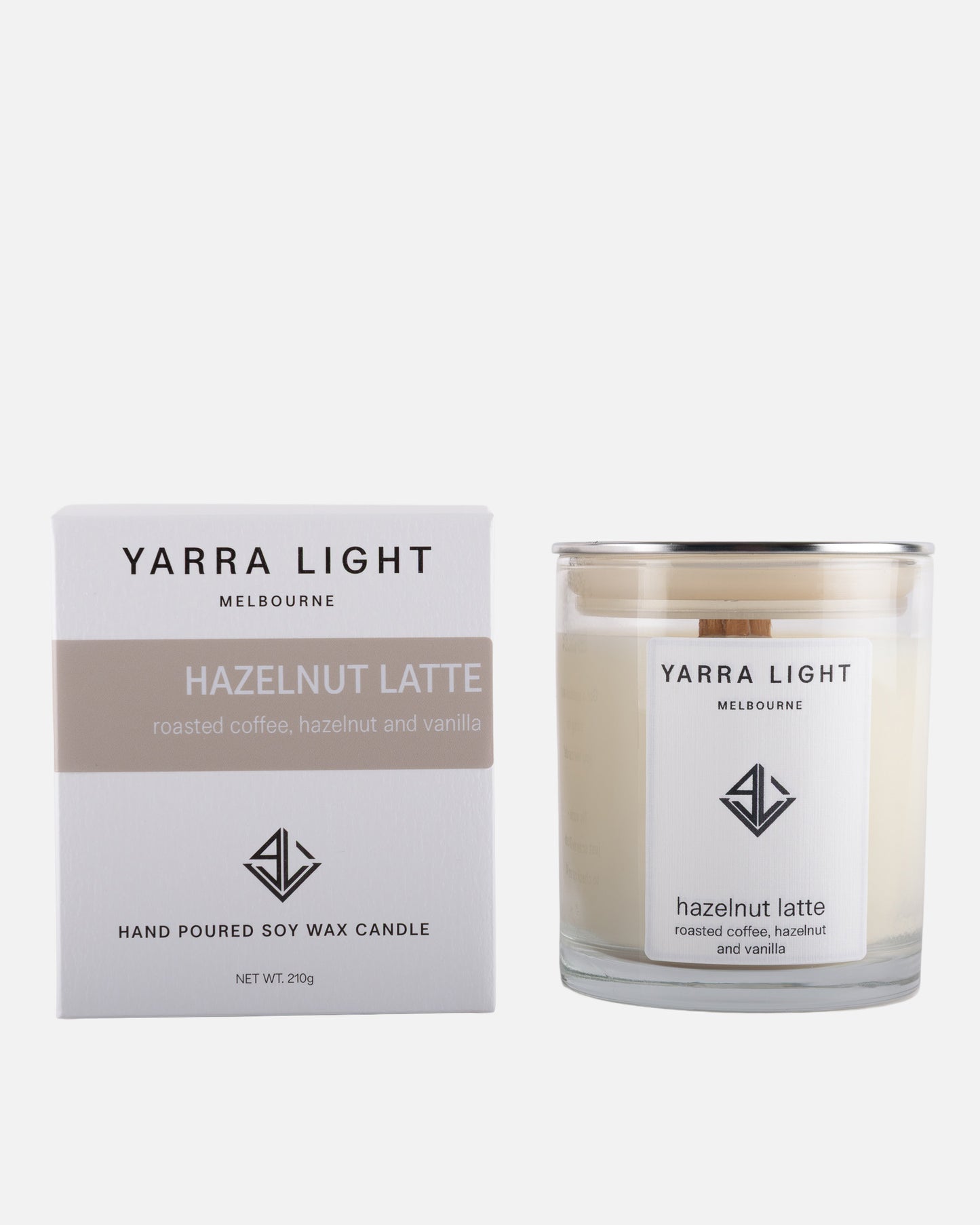 Yarra Light hazelnut latte soy wax candle and packaging on a white background