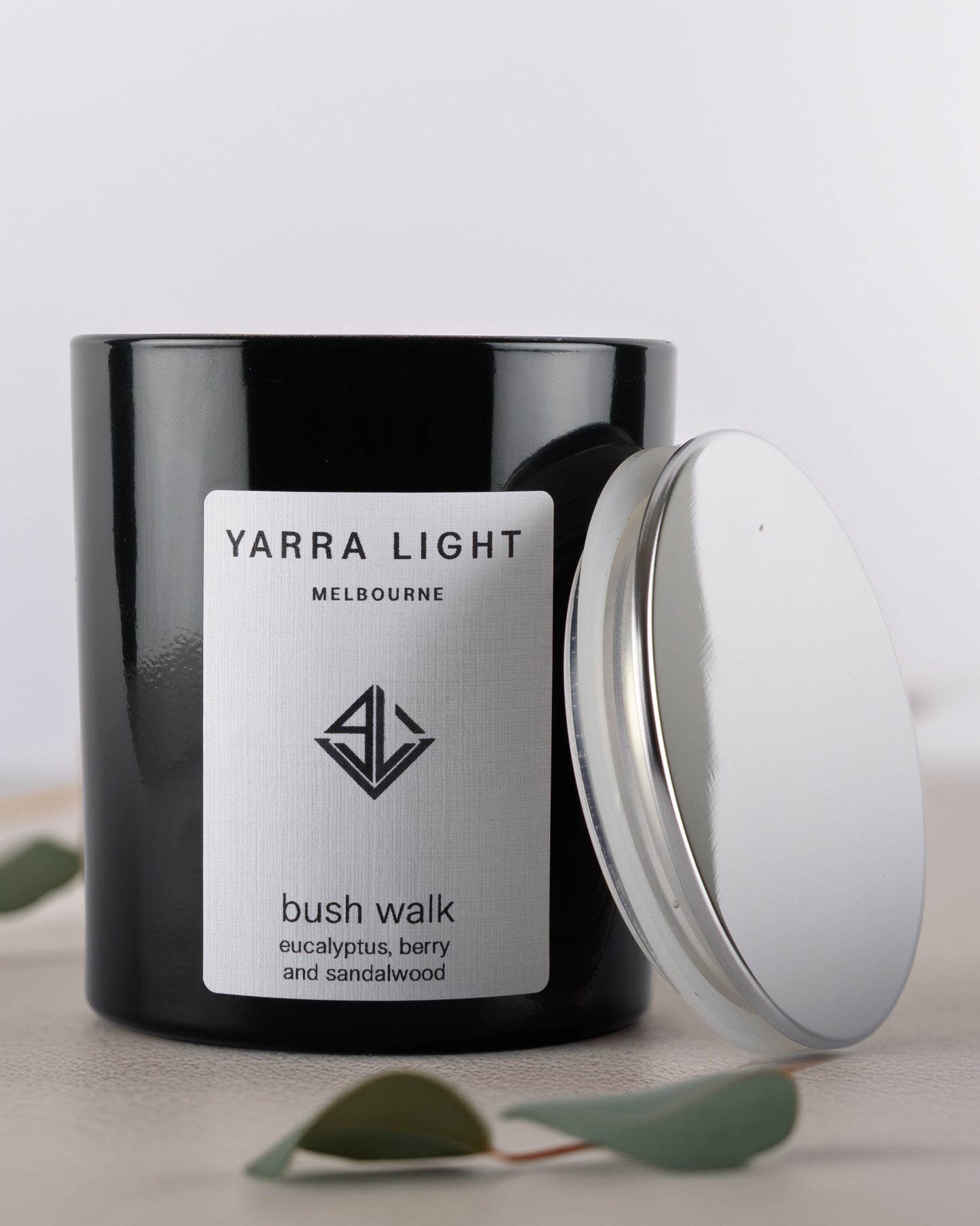 Yarra Light bush walk soy wax candle on a light background.