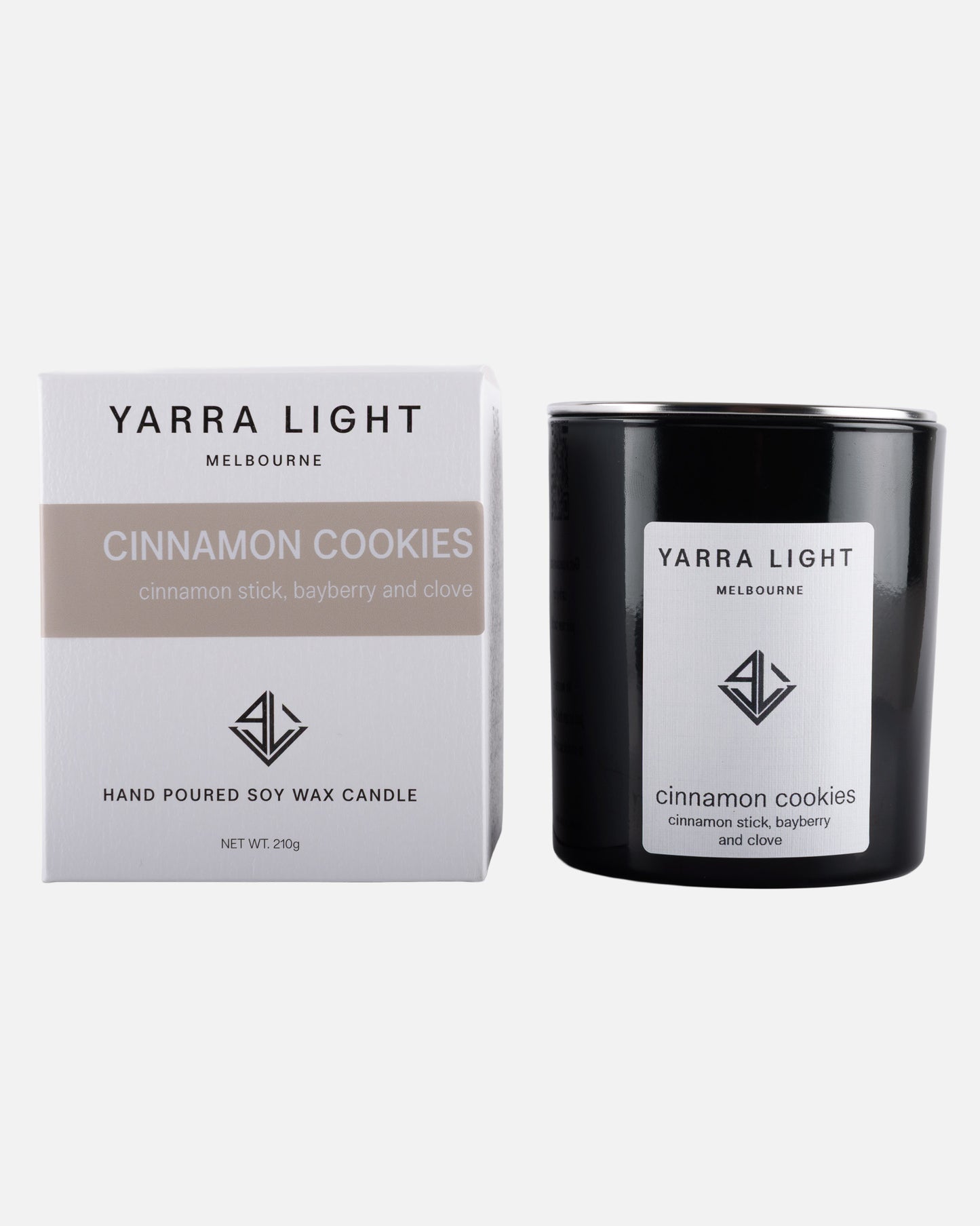 Yarra Light cinnamon cookies soy wax candle and packaging on a white background
