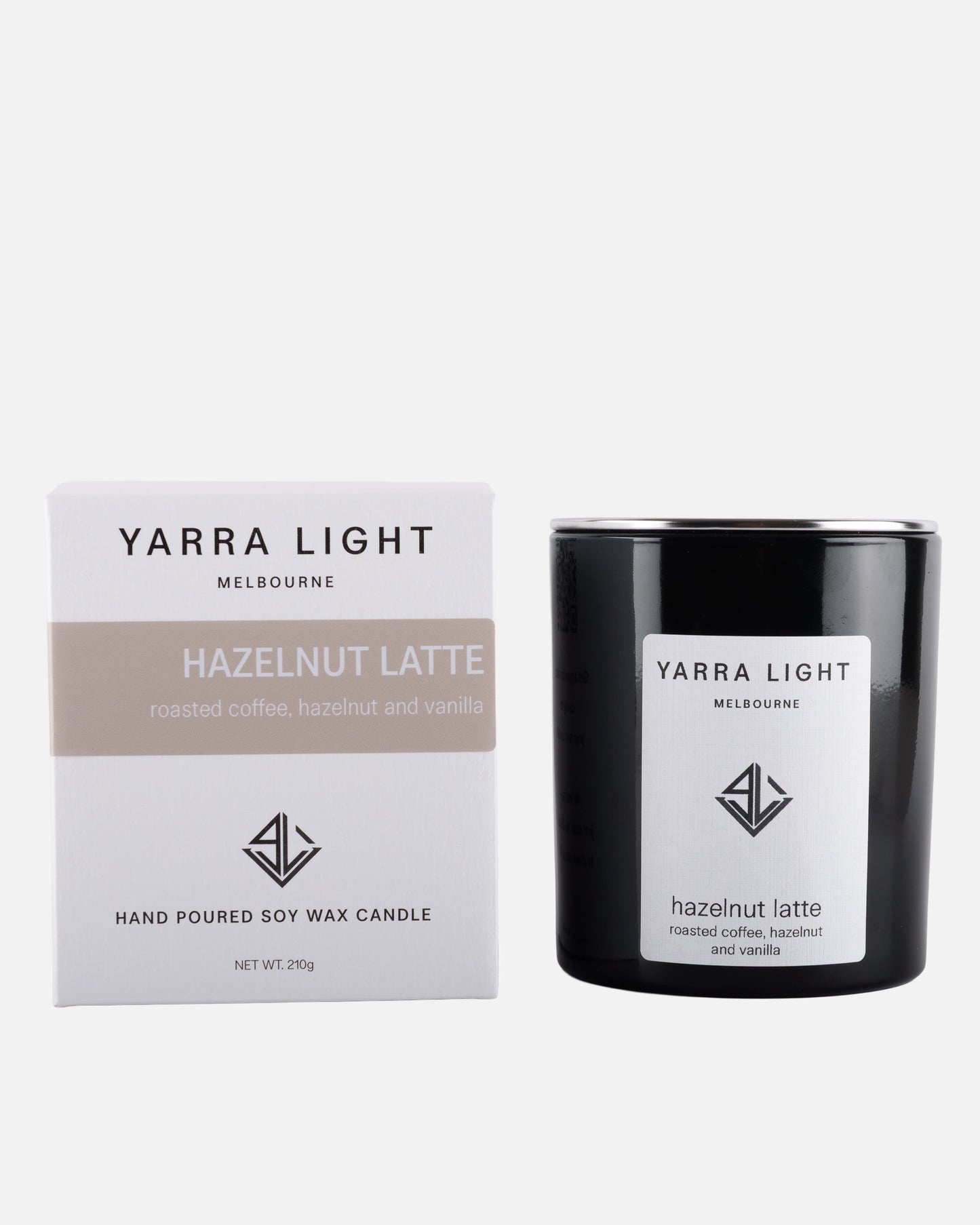 Yarra Light hazelnut latte soy wax candle and packaging on a white background