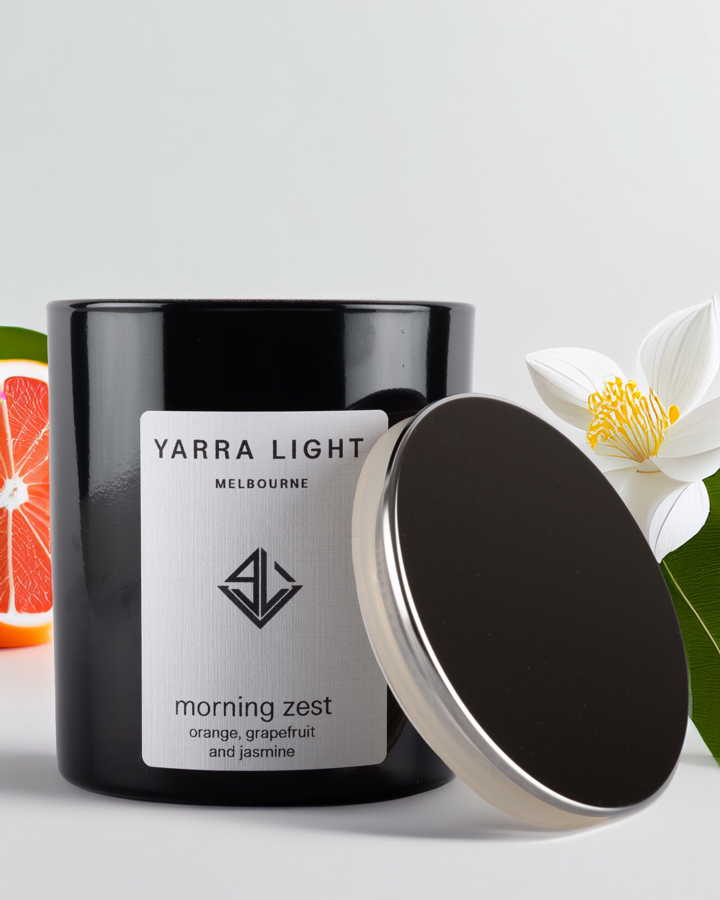 Yarra Light soy wax candle with a silver lid on a light background