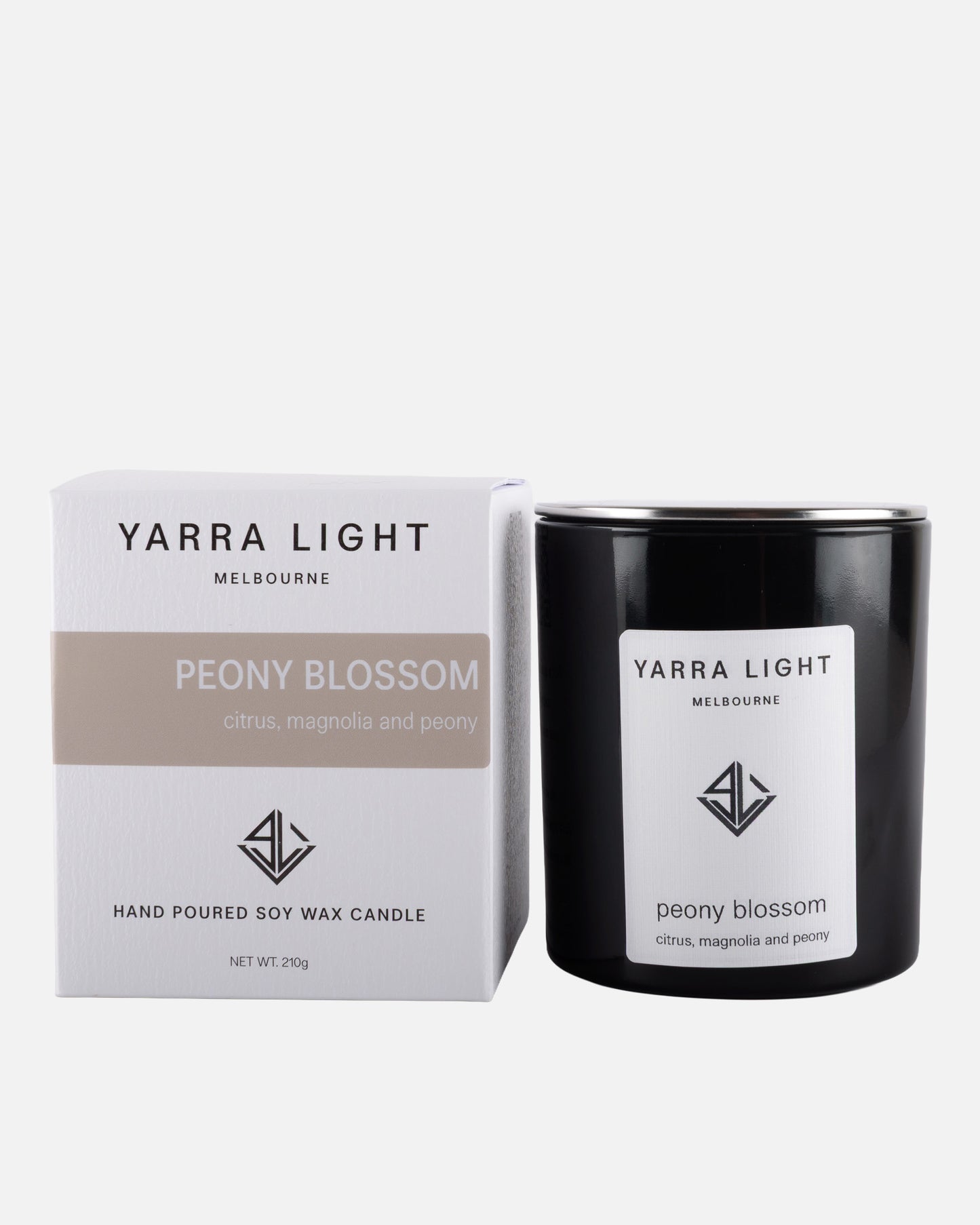 Yarra Light peony blossom soy wax candle and packaging on a white background