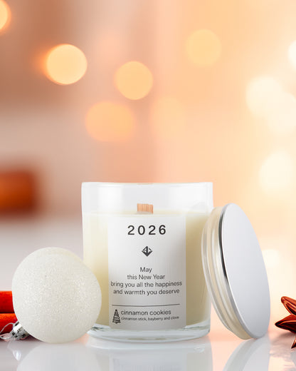 Yarra Light soy wax candle with '2026' text and festive decorations on a blurred background