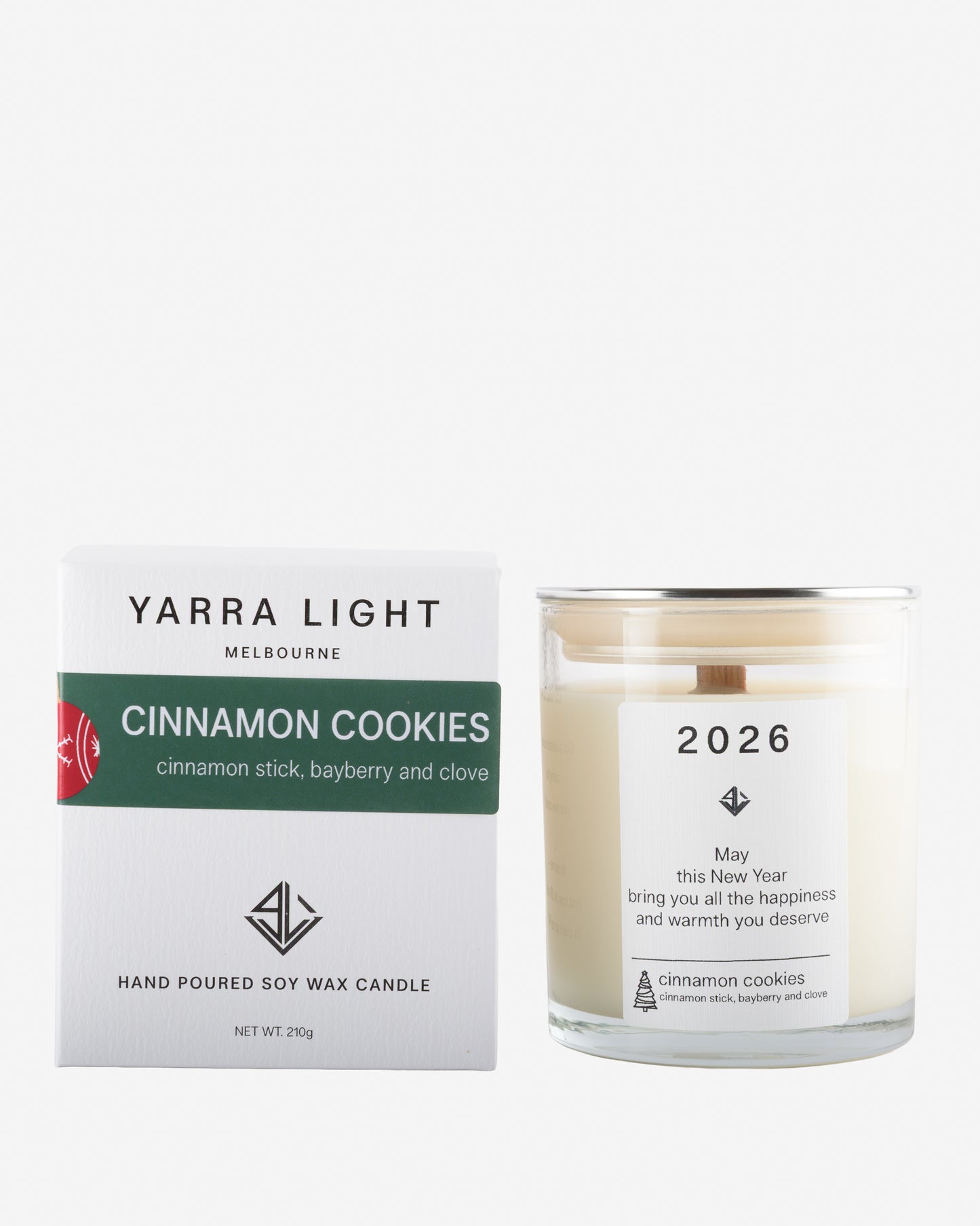 Yarra Light cinnamon cookies soy wax candle and packaging on a white background
