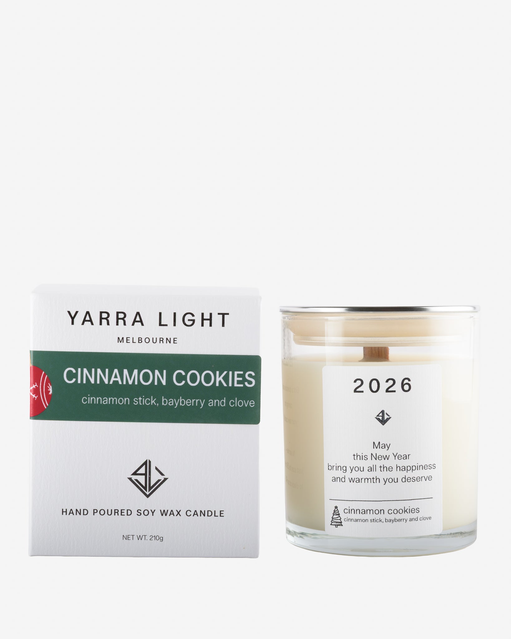 Yarra Light cinnamon cookies soy wax candle and packaging on a white background