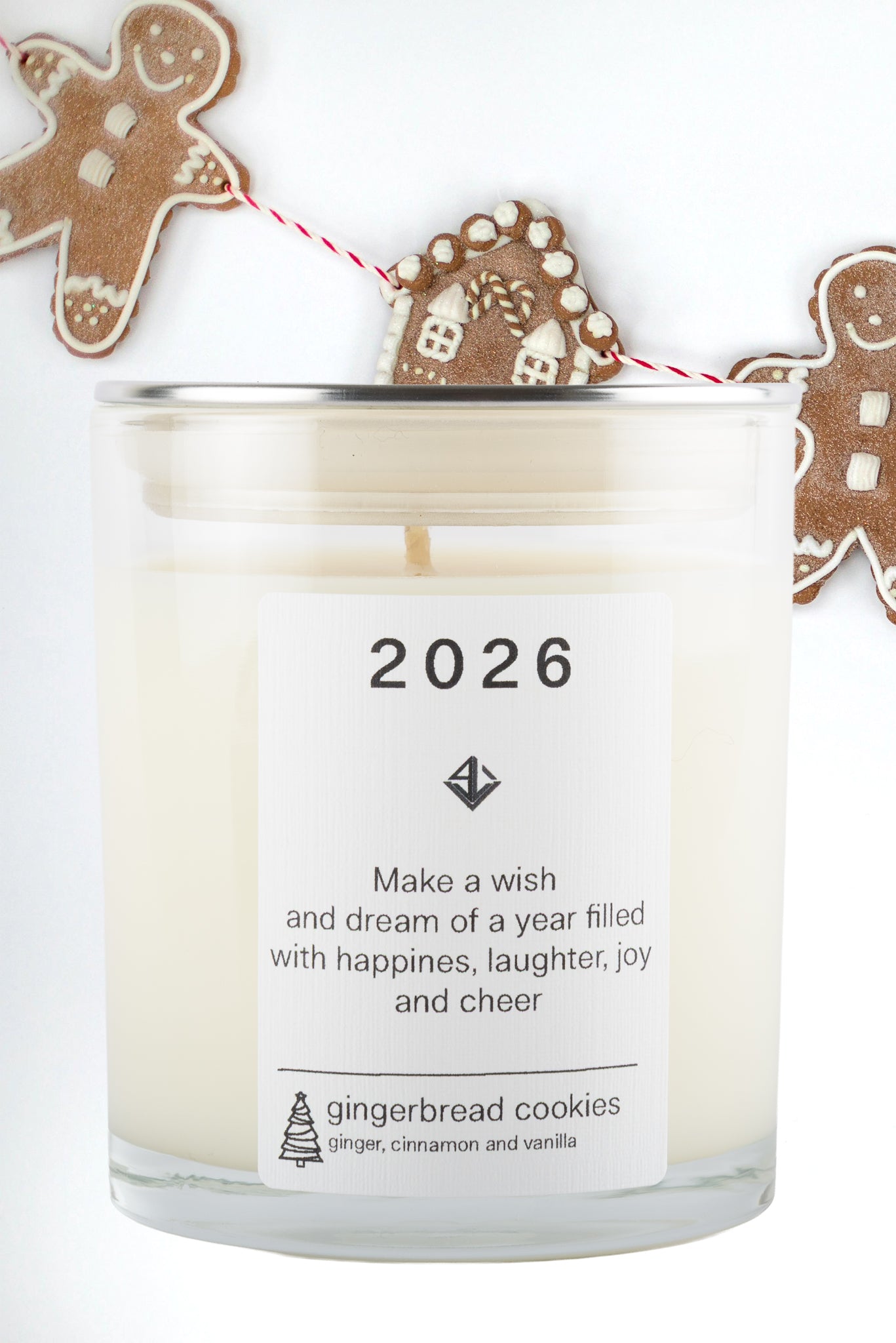 Yarra Ligh soy candle with '2026' text and gingerbread cookies on a white background