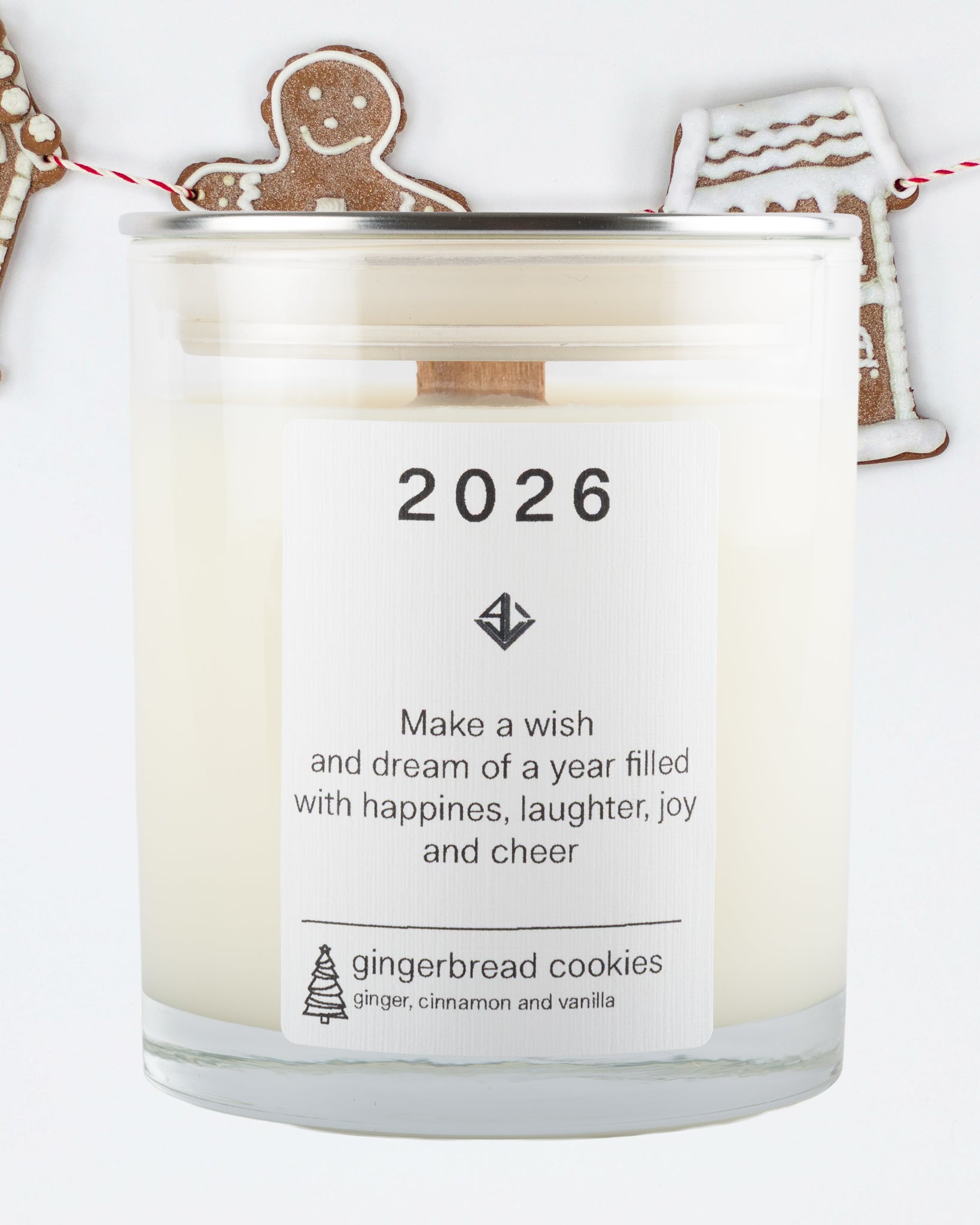 Yarra Light soy wax candle with a label featuring the year 2026 and gingerbread cookie decorations.