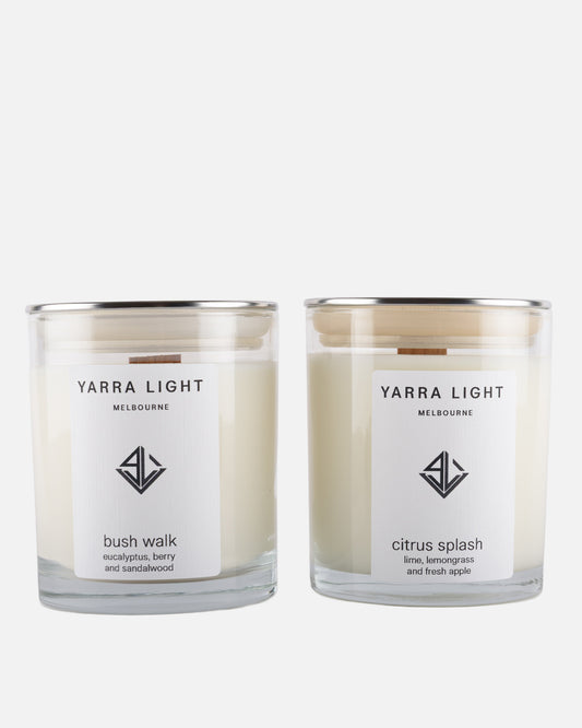 Two Yarra Light soy wax candles on a white background