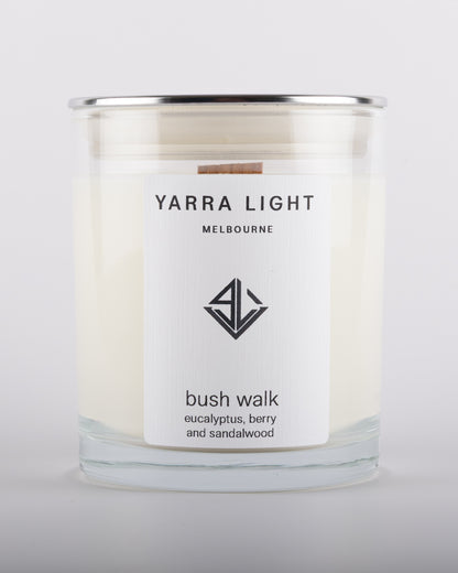 Bush Walk soy wax scented candle in a clear glass jar with minimalist label.
