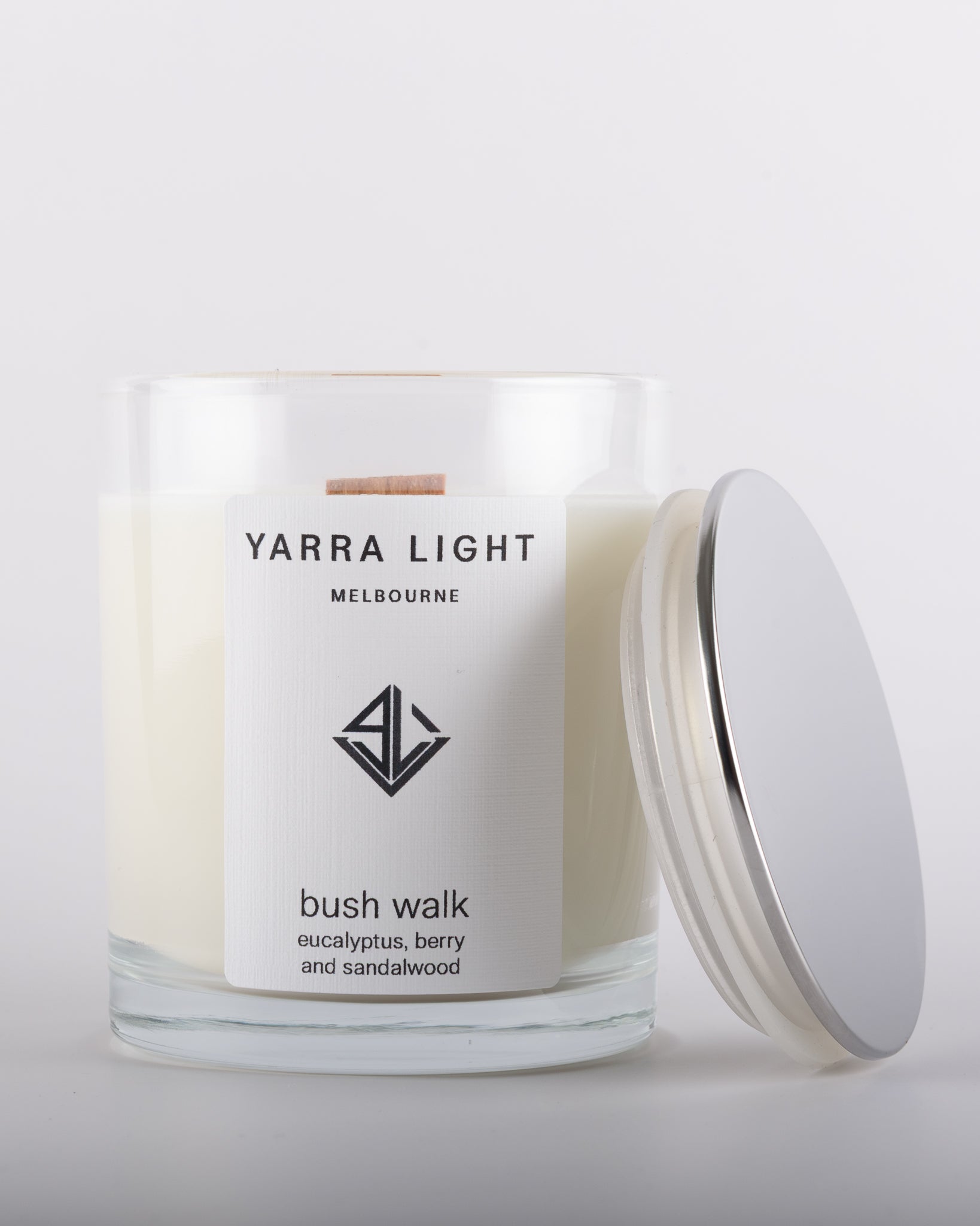Bush Walk soy wax scented candle in a clear glass jar with minimalist label.