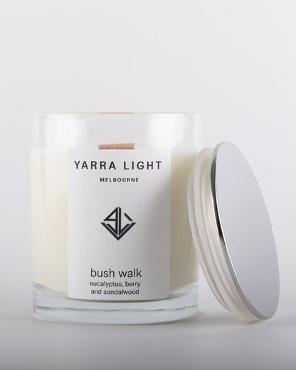Bush Walk soy wax scented candle in a clear glass jar with minimalist label.