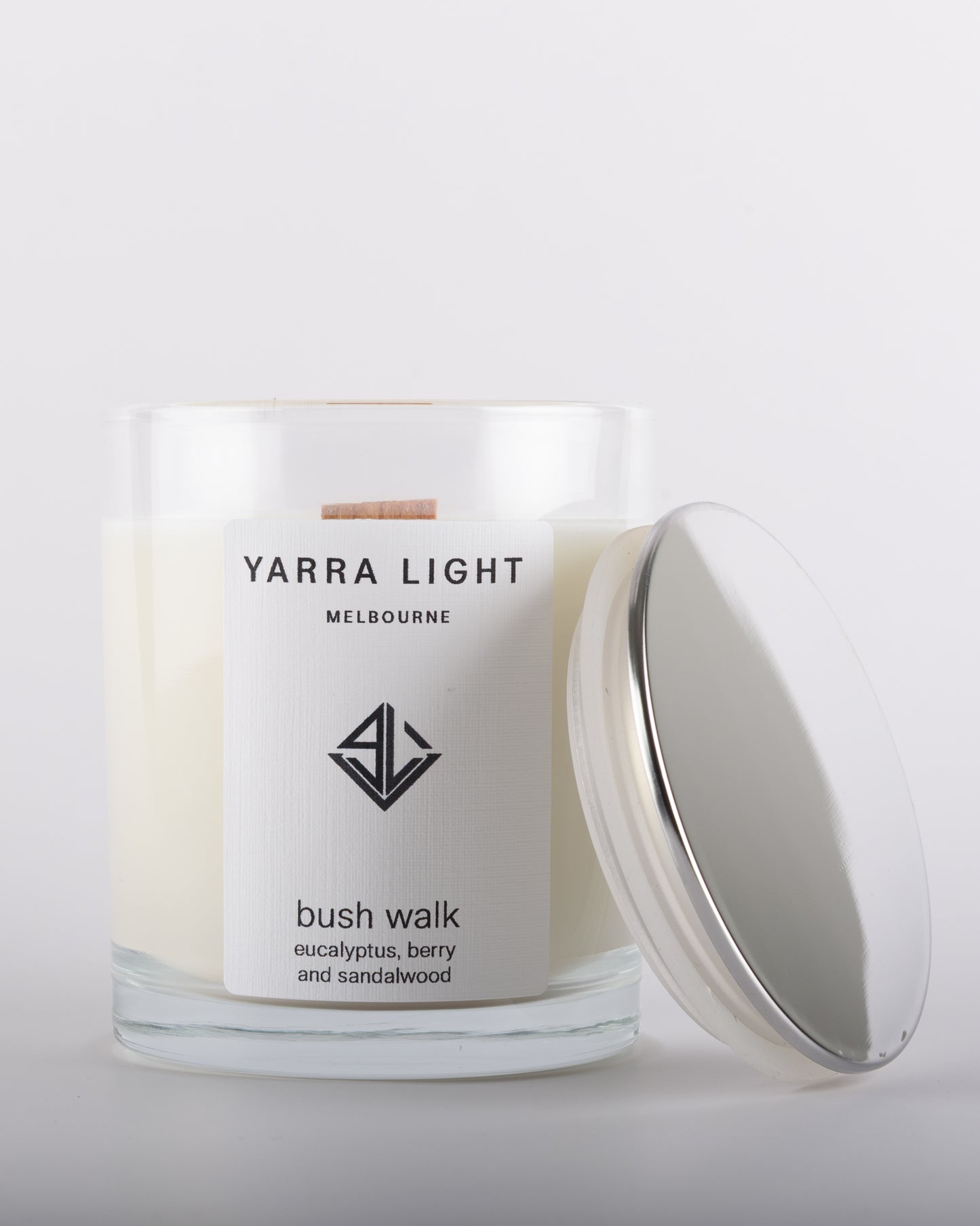 Bush Walk soy wax scented candle in a clear glass jar with minimalist label.