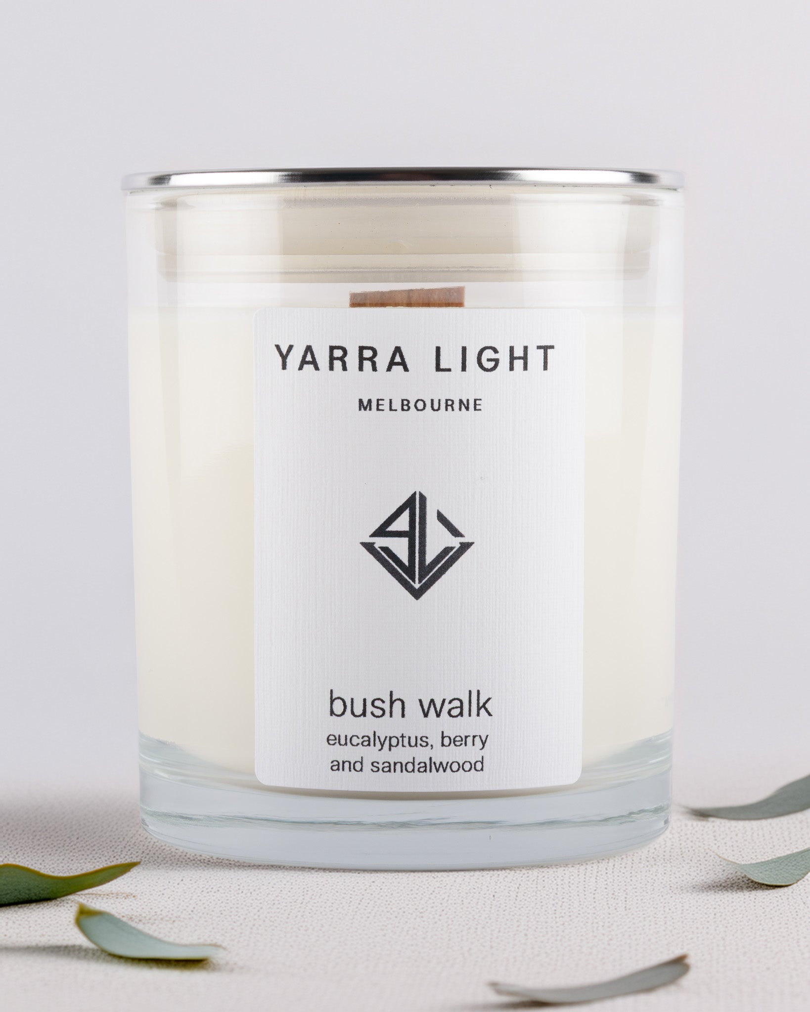 Yarra Light bush walk soy wax candle with a label on a light background