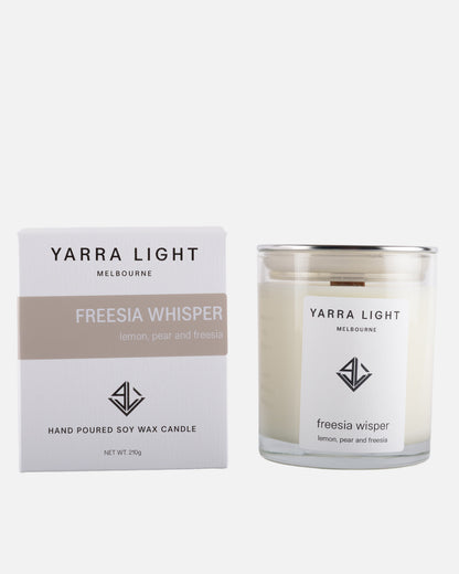 Yarra Light Freesia Whisper soy wax candle and packaging on a white background