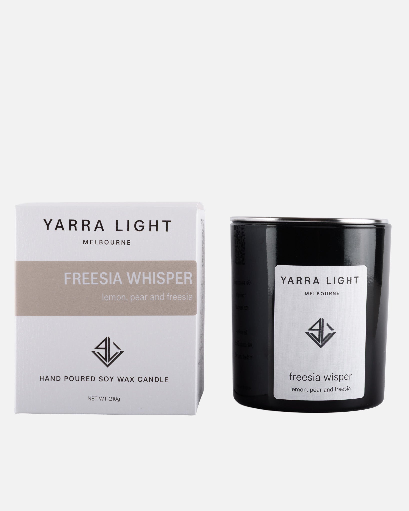 Yarra Light Freesia Whisper soy wax candle and packaging on a white background