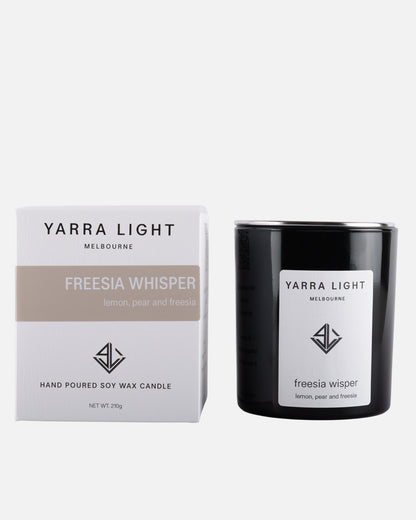 Yarra Light Freesia Whisper soy wax candle and packaging on a white background