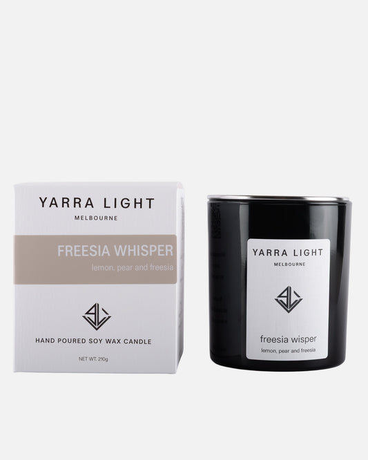 Yarra Light Freesia Whisper soy wax candle and packaging on a white background