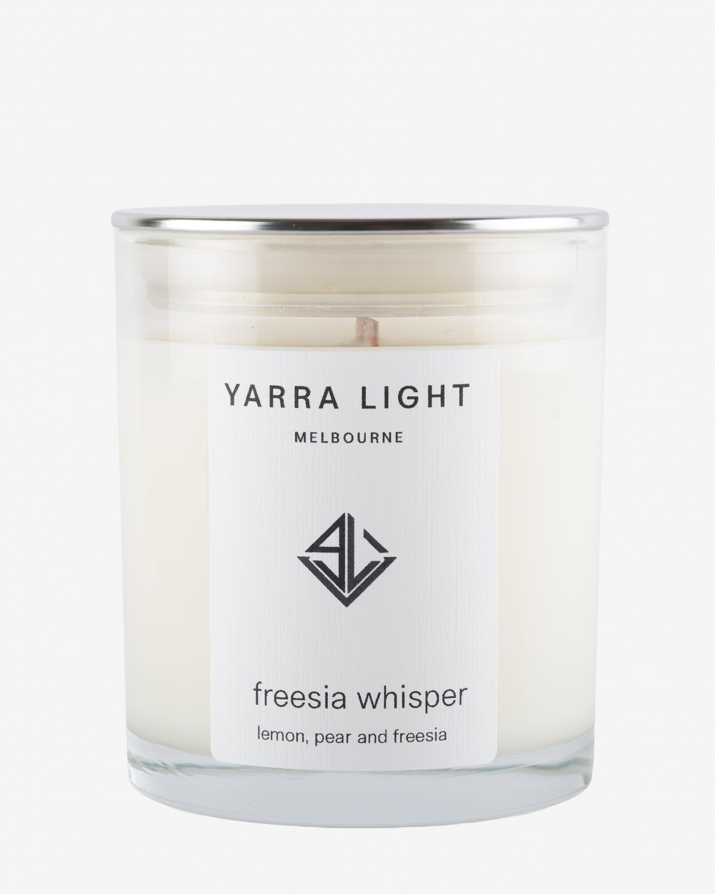 Yarra Light candle with 'freesia whisper' label on a white background