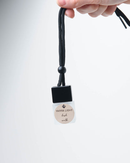Bush Walk hanging car diffuser, long-lasting car air freshener in a glass bottle with notes of eucalyptus, berry and sandalwood.