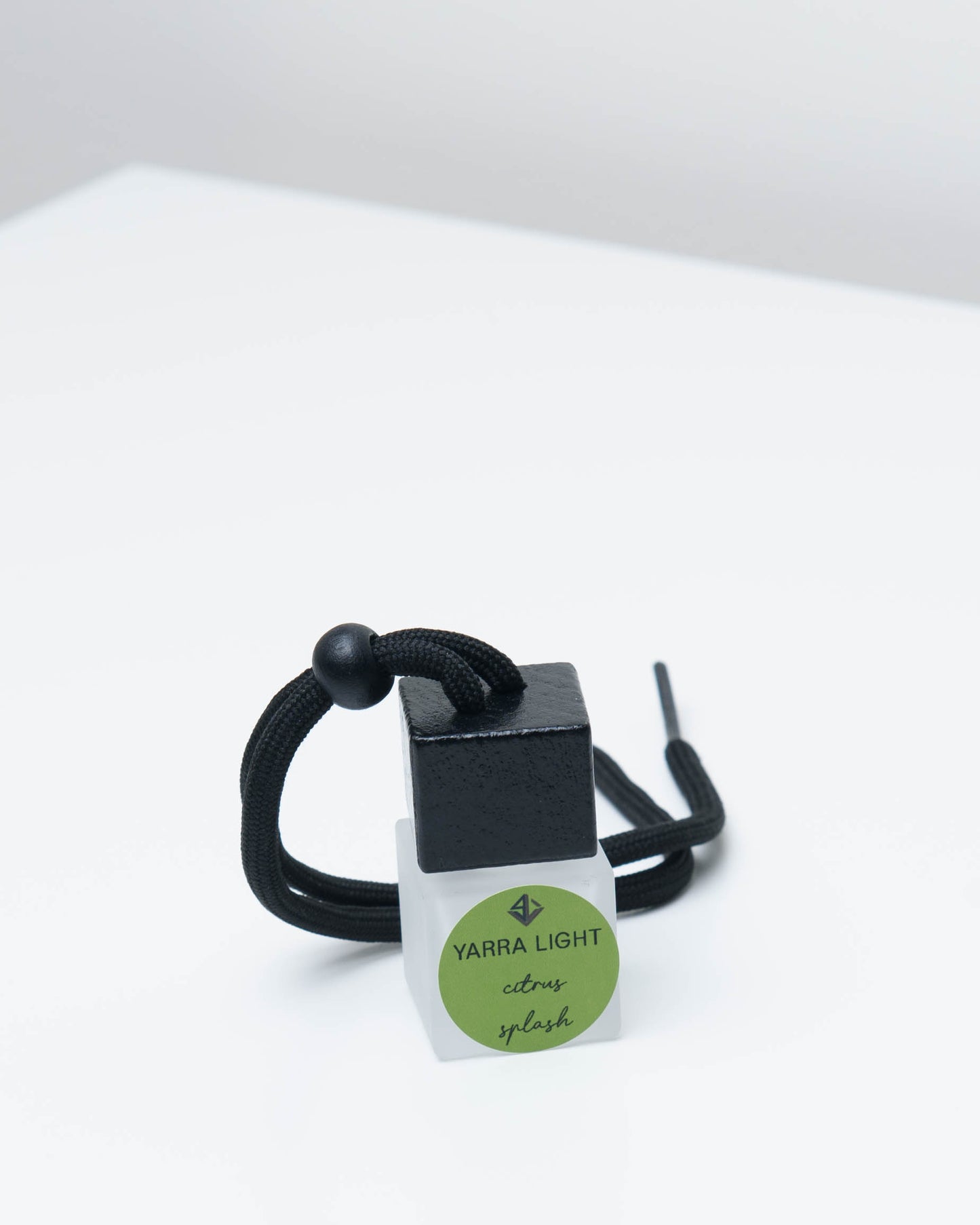 Citrus Splash hanging car diffuser, long-lasting citrus car air freshener in a stylish glass bottle.