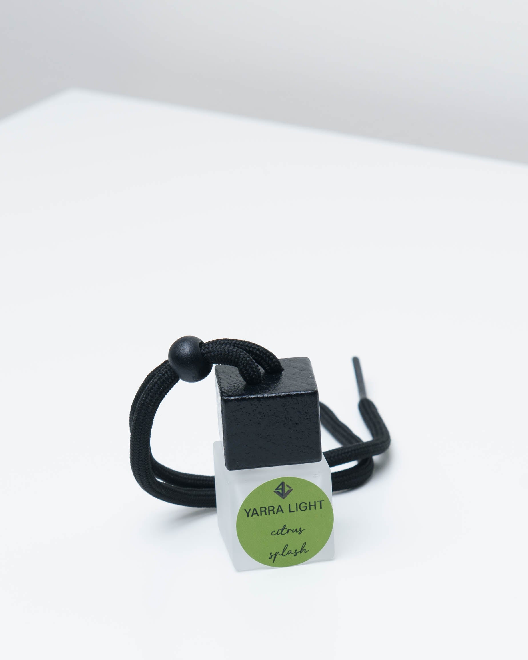 Citrus Splash hanging car diffuser, long-lasting citrus car air freshener in a stylish glass bottle.