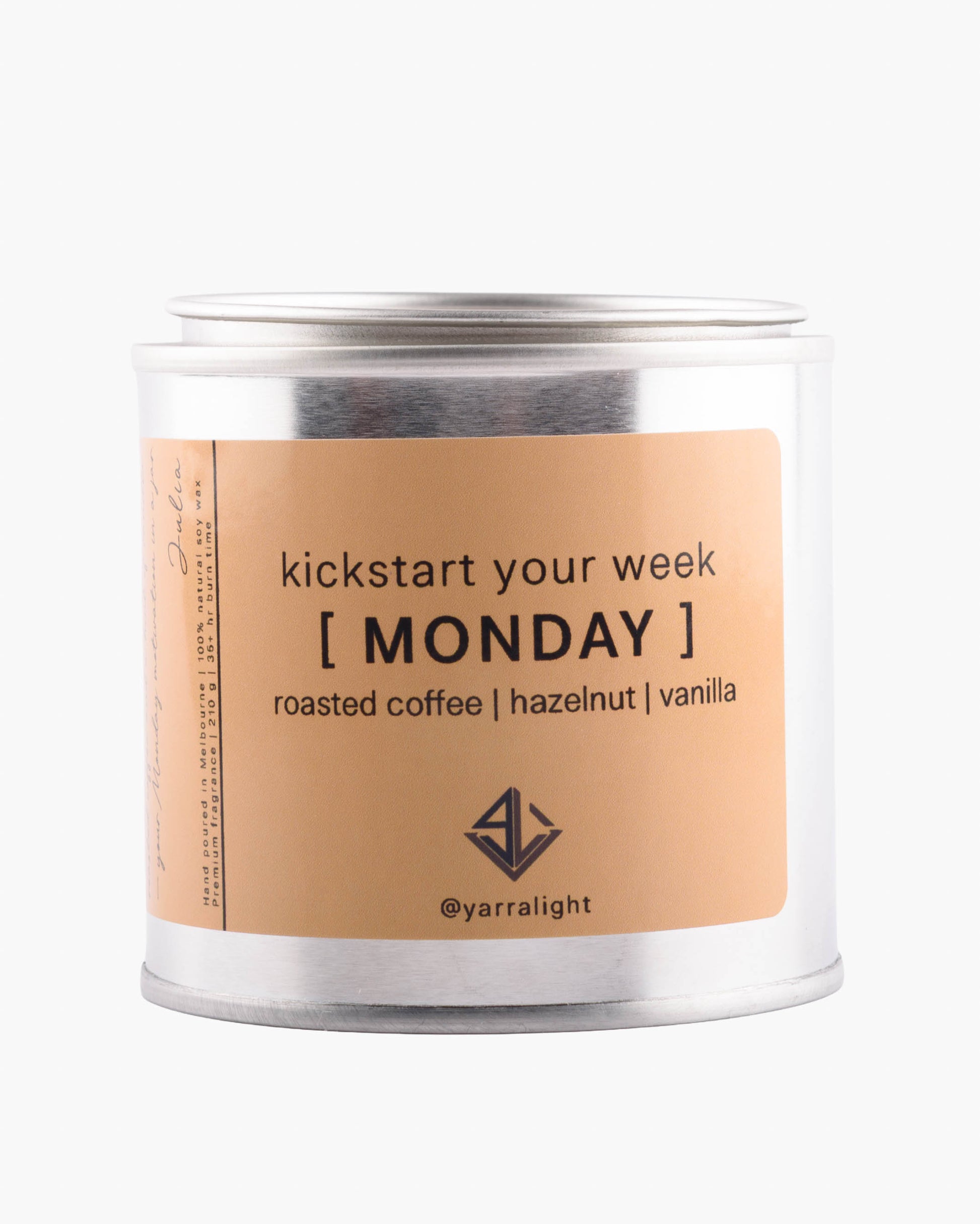 Candle jar with a label reading 'kickstart your week [MONDAY]' on a white background.