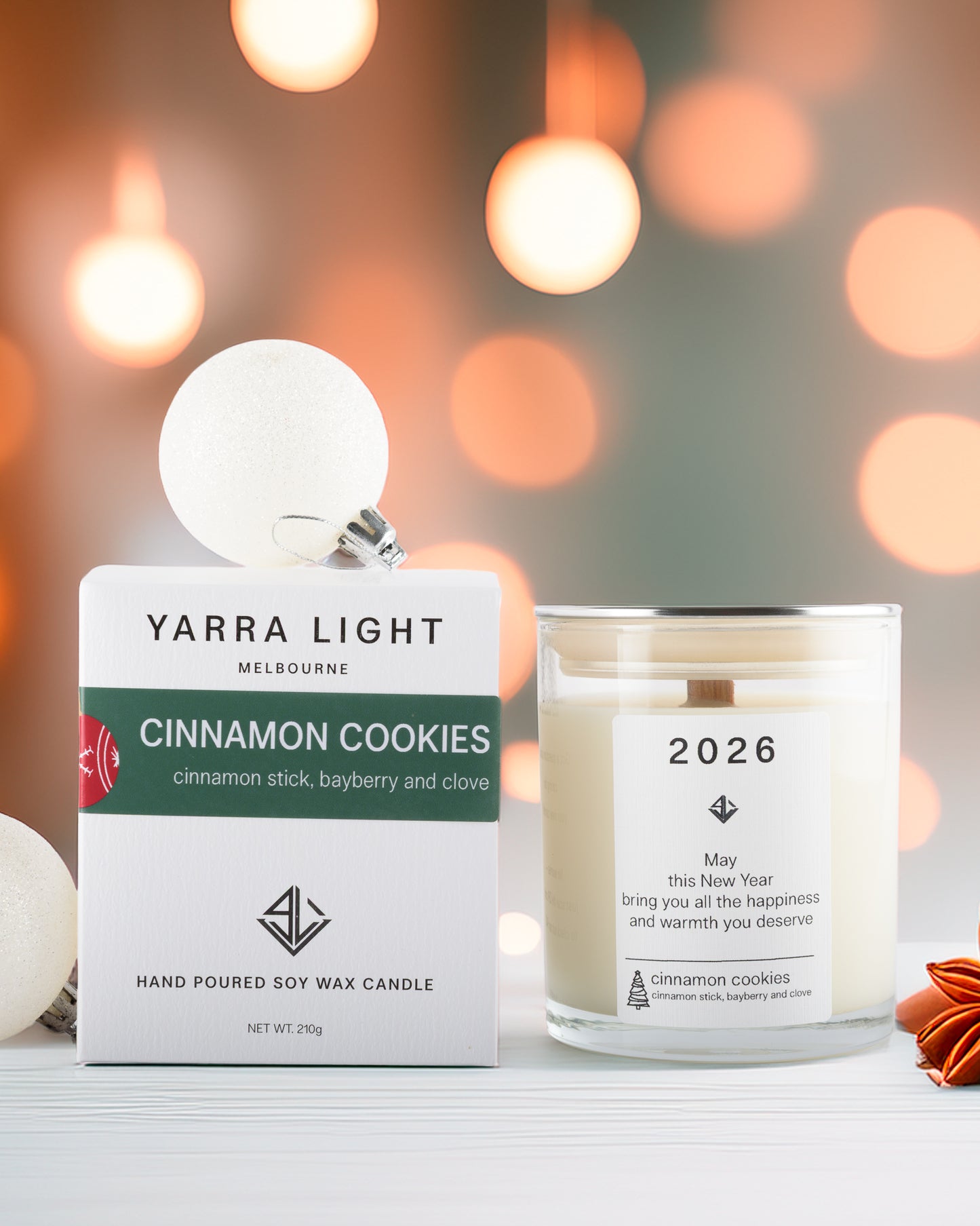 Yarra Light cinnamon cookies soy wax and packaging with a blurred bokeh background