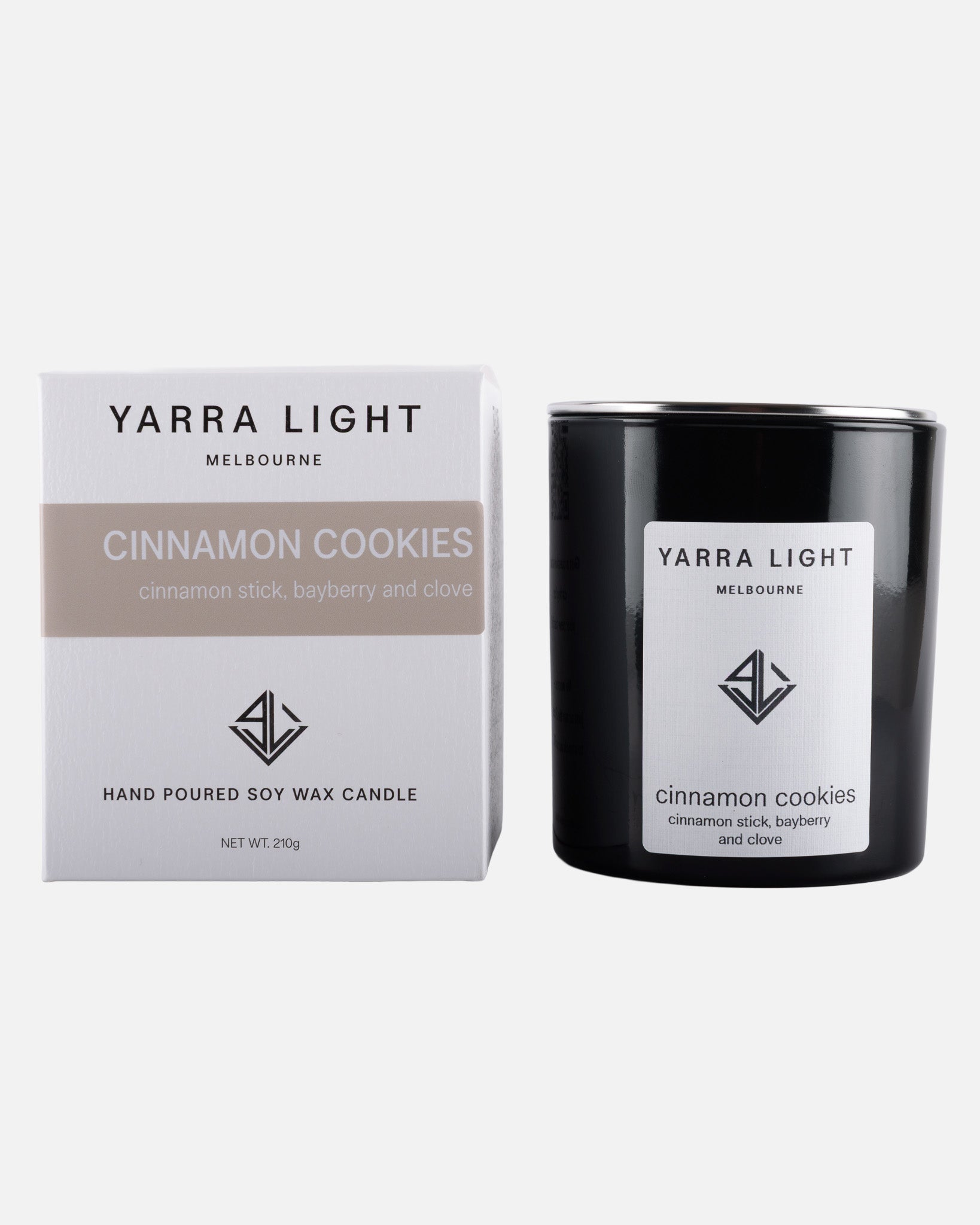 Yarra Light cinnamon cookies soy wax  candle and packaging on a white background
