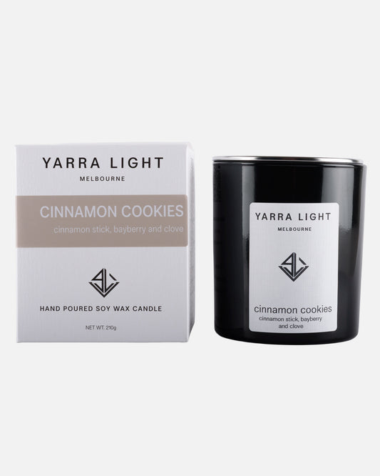 Yarra Light cinnamon cookies soy wax  candle and packaging on a white background