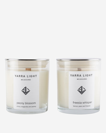 Two Yarra Light soy wax candles on a white background