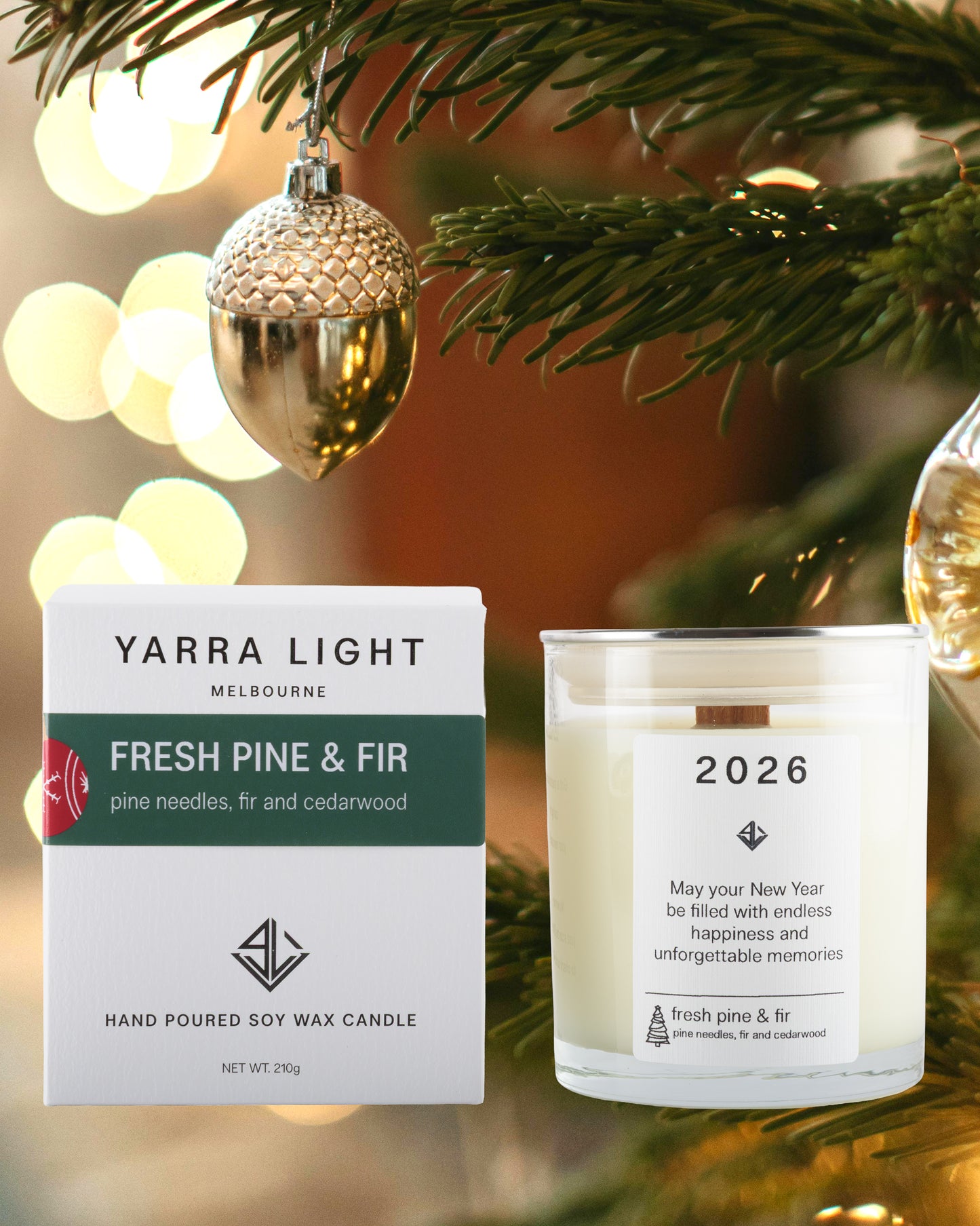 Yarra Light Fresh Pine & Fir candle and packaging on a Christmas tree background