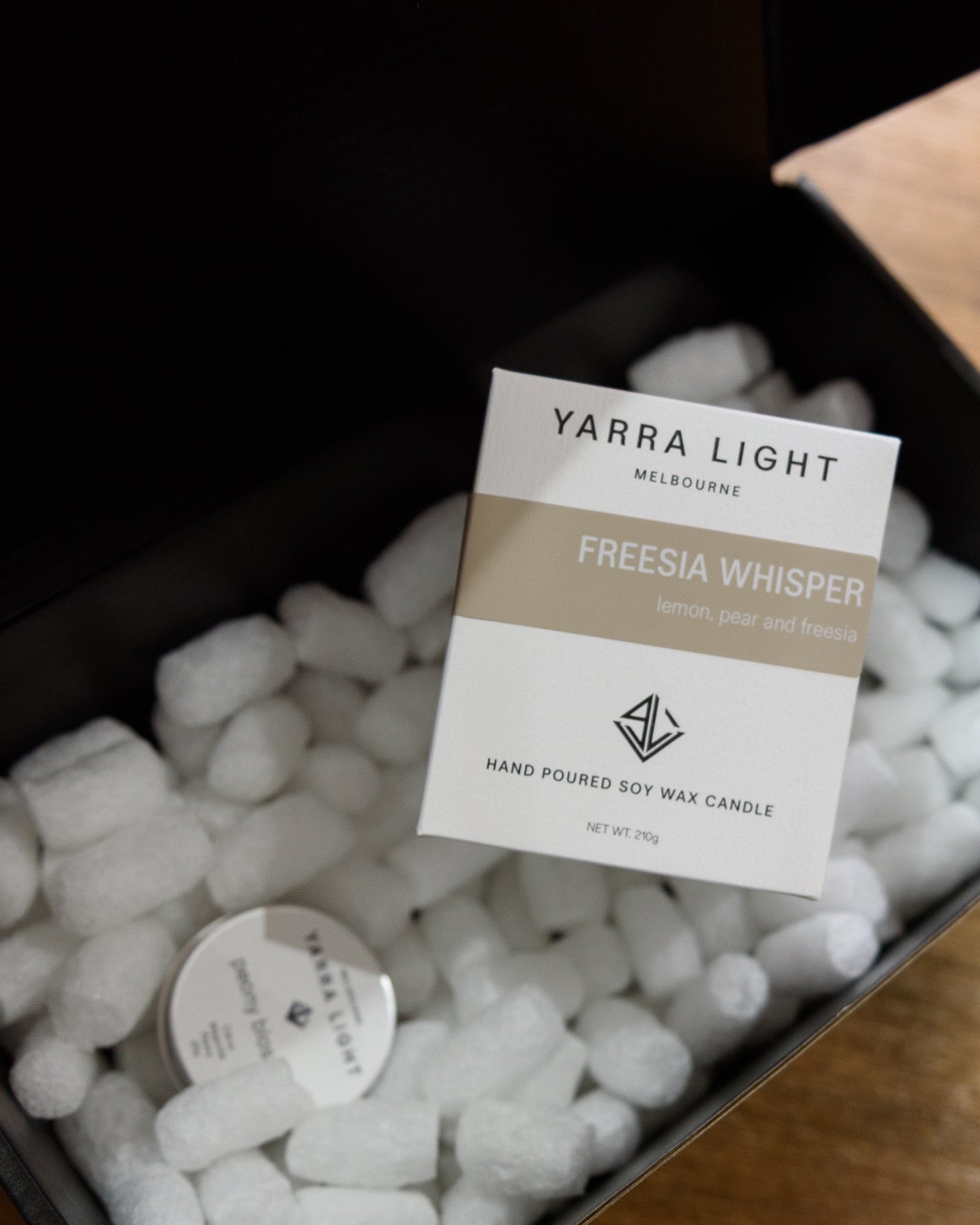 Yarra Light Freesia Whisper soy wax candle in eco-friendly packaging box
