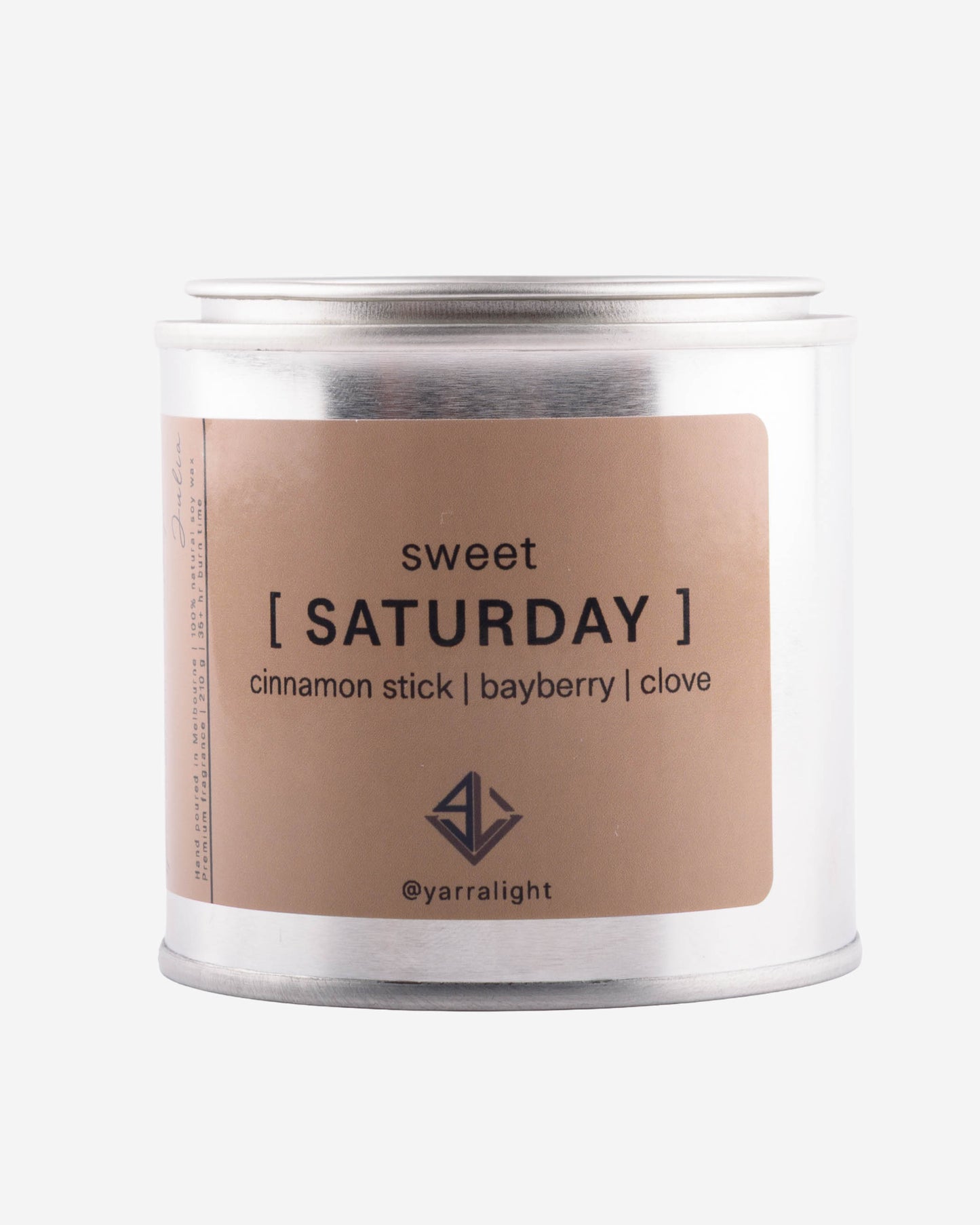 Hand poured soy wax scented candle labeled 'sweet saturday' on a white background